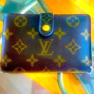 Louis Vuitton kiss fold wallet. Price drop for one hour today